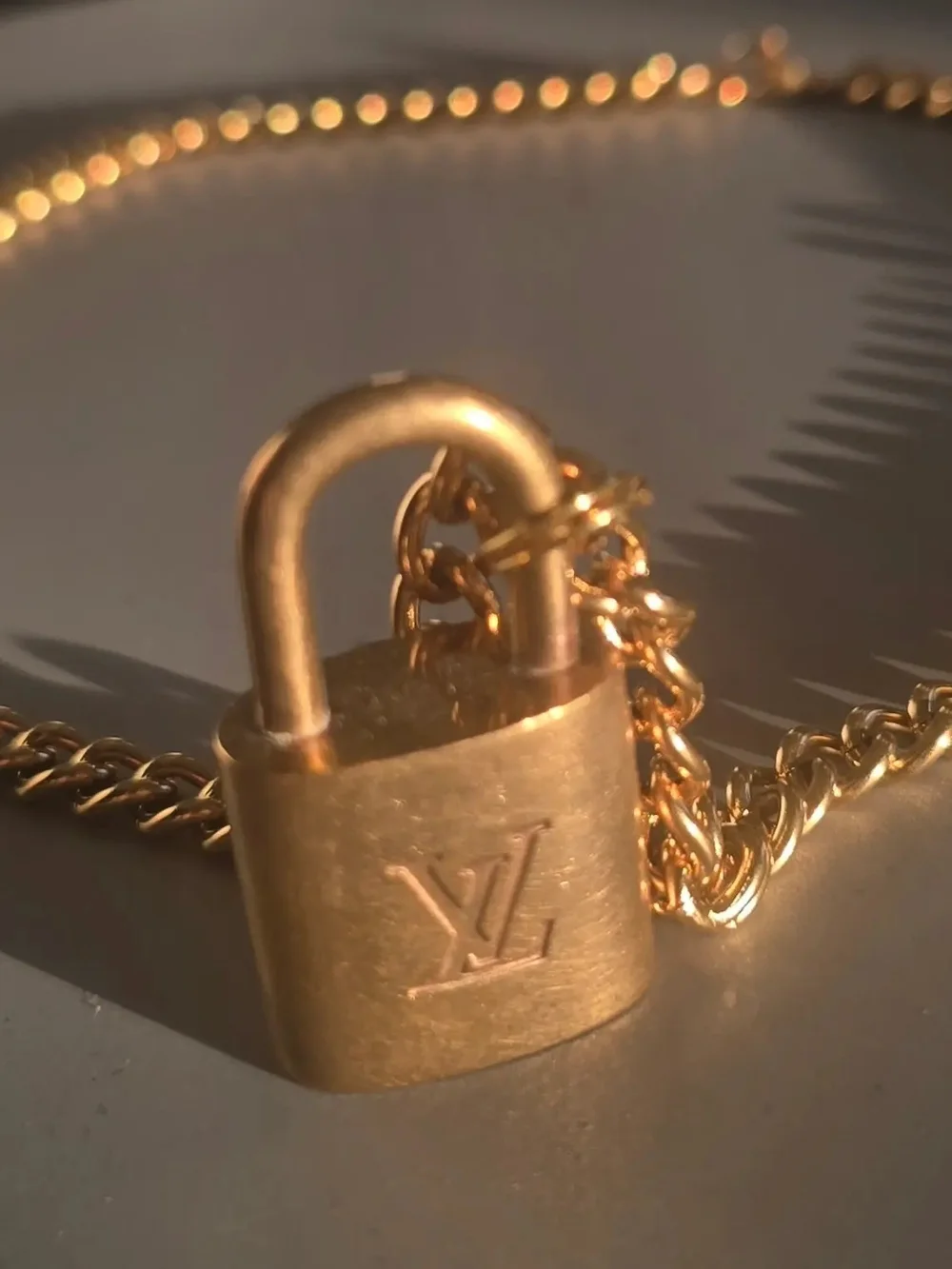 Authentic Louis Vuitton Lock On 18k Gold Plated Keychain/Keyrings/Necklaces Show